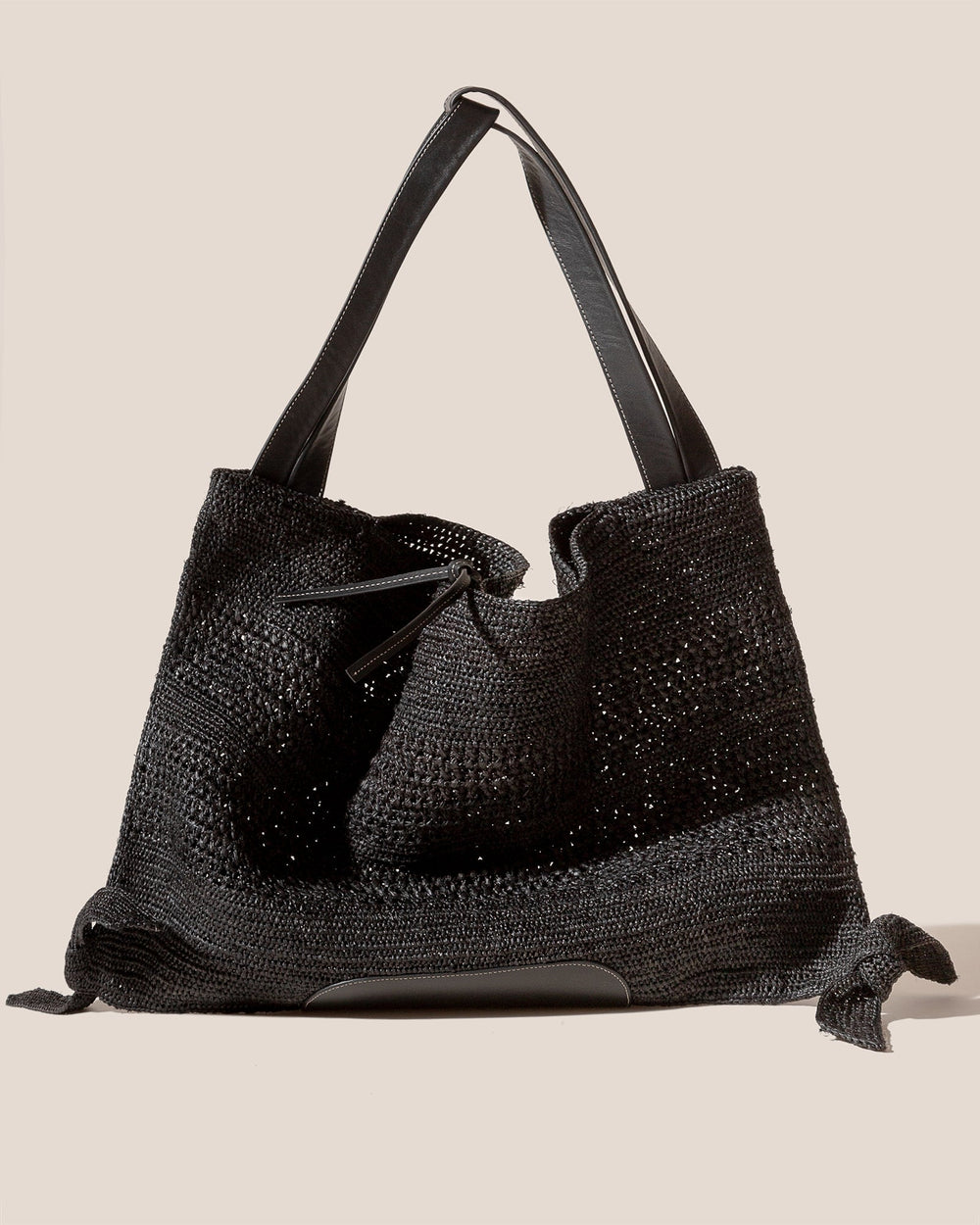 CADOR - Slouchy Crocheted Raffia Shoulder Bag | Hereu sale
