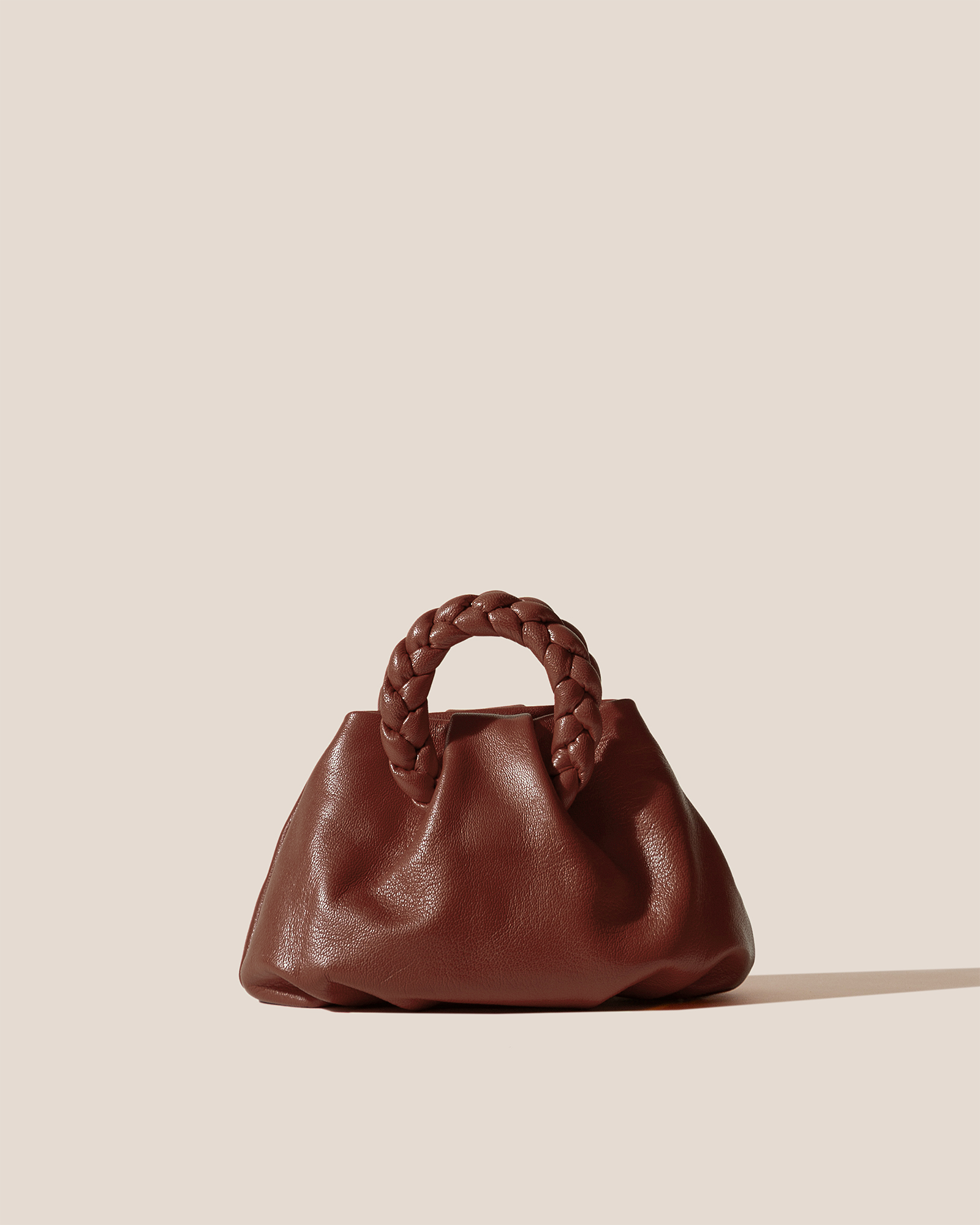 BOMBON SUPPLE SHINY - Plaited-handle Leather Handbag | Hereu US