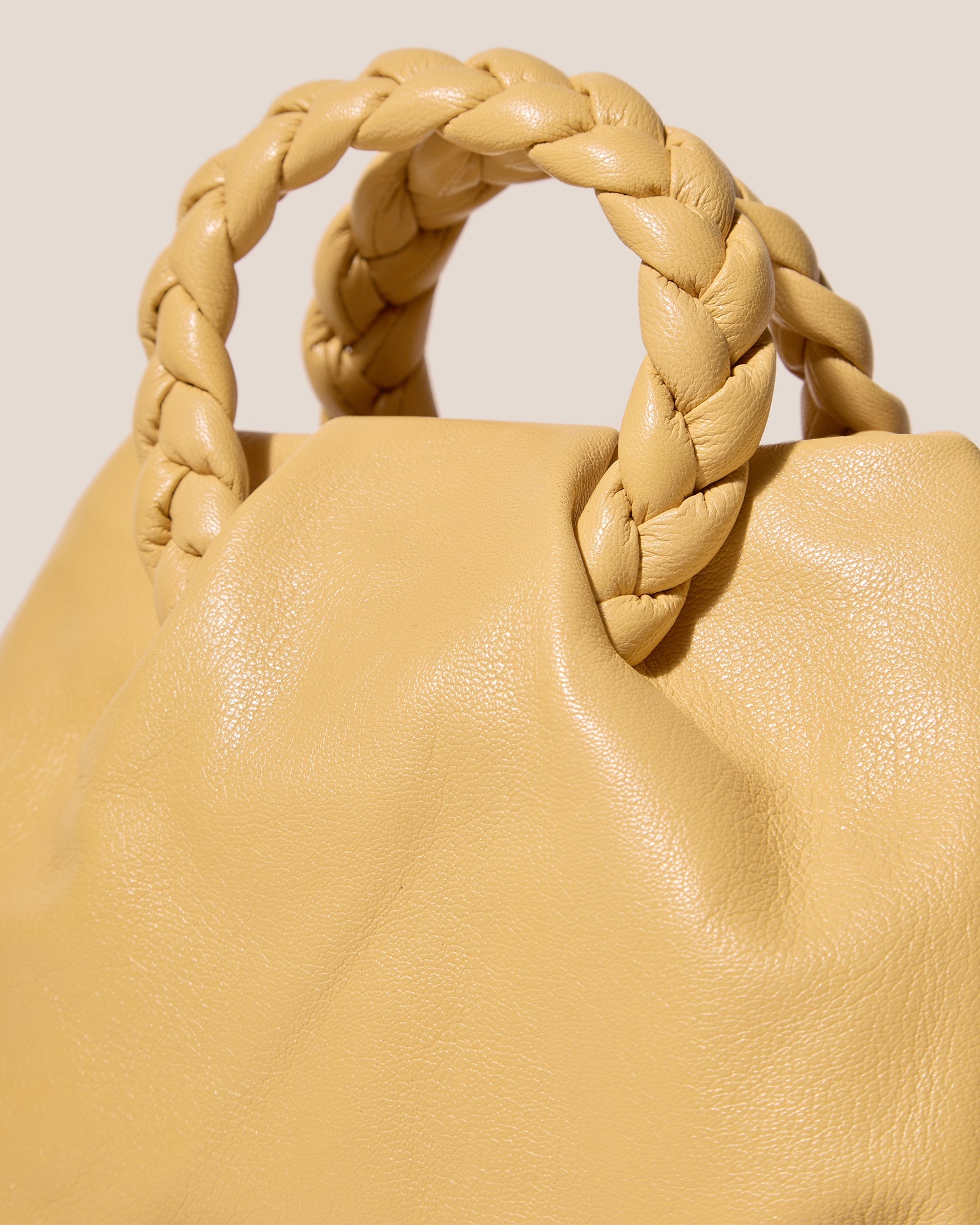 BOMBON M SUPPLE SHINY - Medium Plaited-handle Leather Handbag | Hereu online