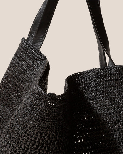 CADOR - Slouchy Crocheted Raffia Shoulder Bag | Hereu sale