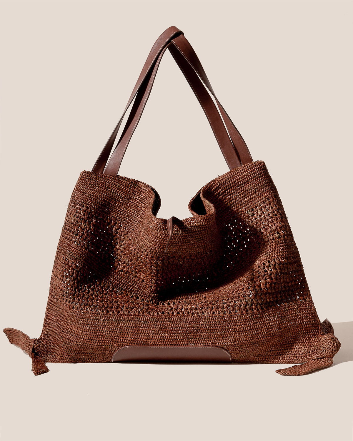 CADOR - Slouchy Crocheted Raffia Shoulder Bag | Hereu online