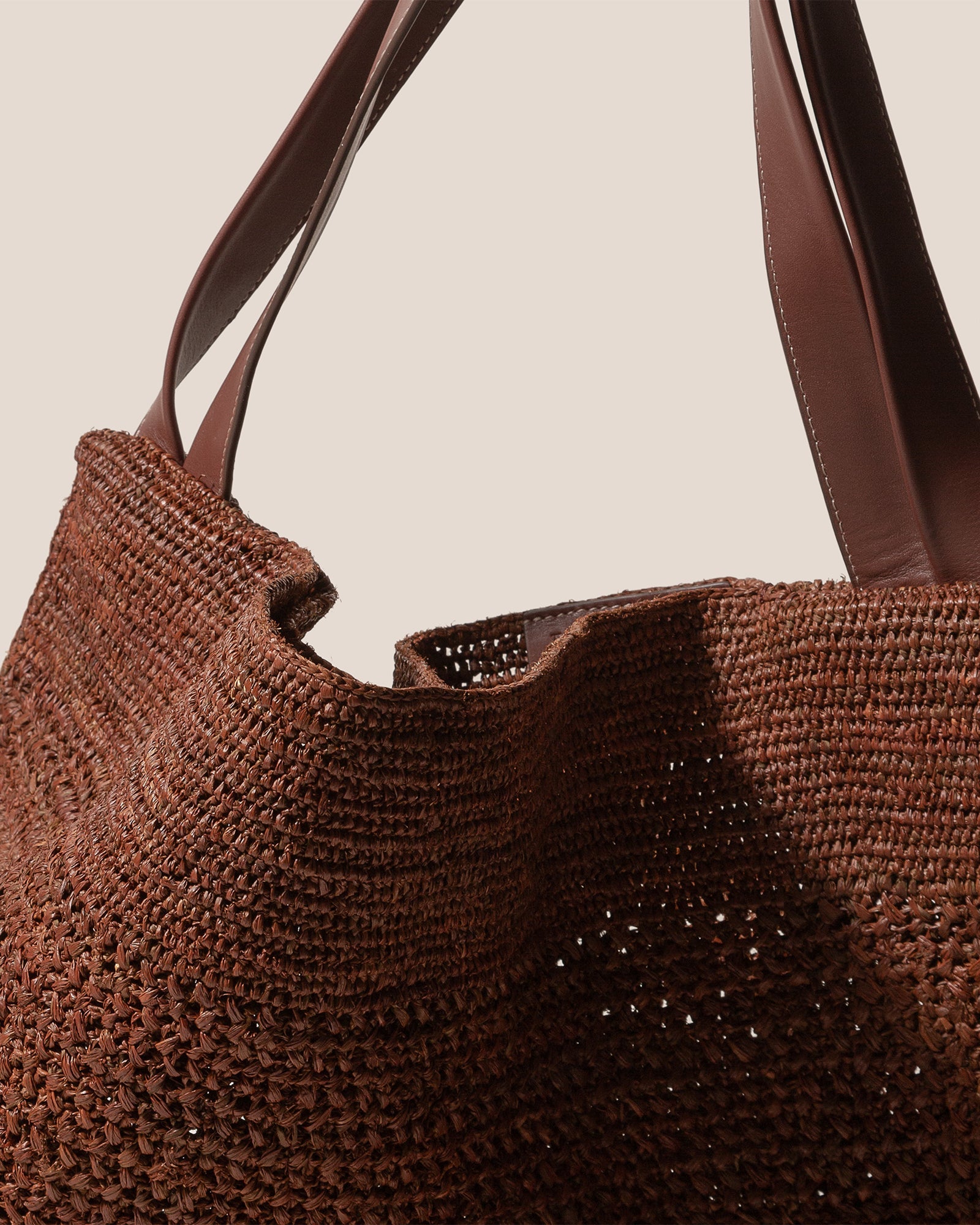 CADOR - Slouchy Crocheted Raffia Shoulder Bag | Hereu online