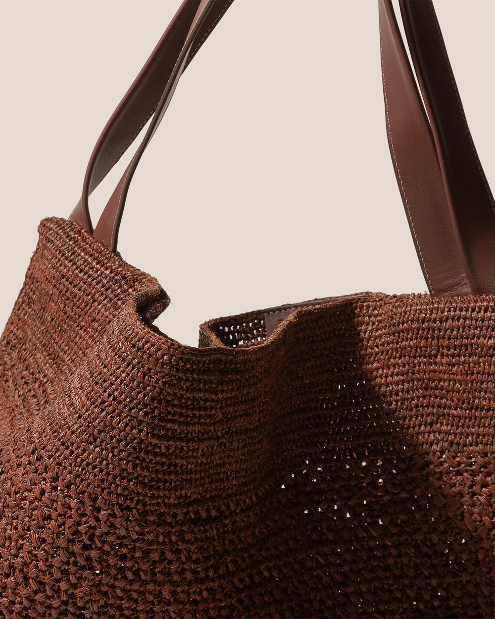 CADOR - Slouchy Crocheted Raffia Shoulder Bag | Hereu online