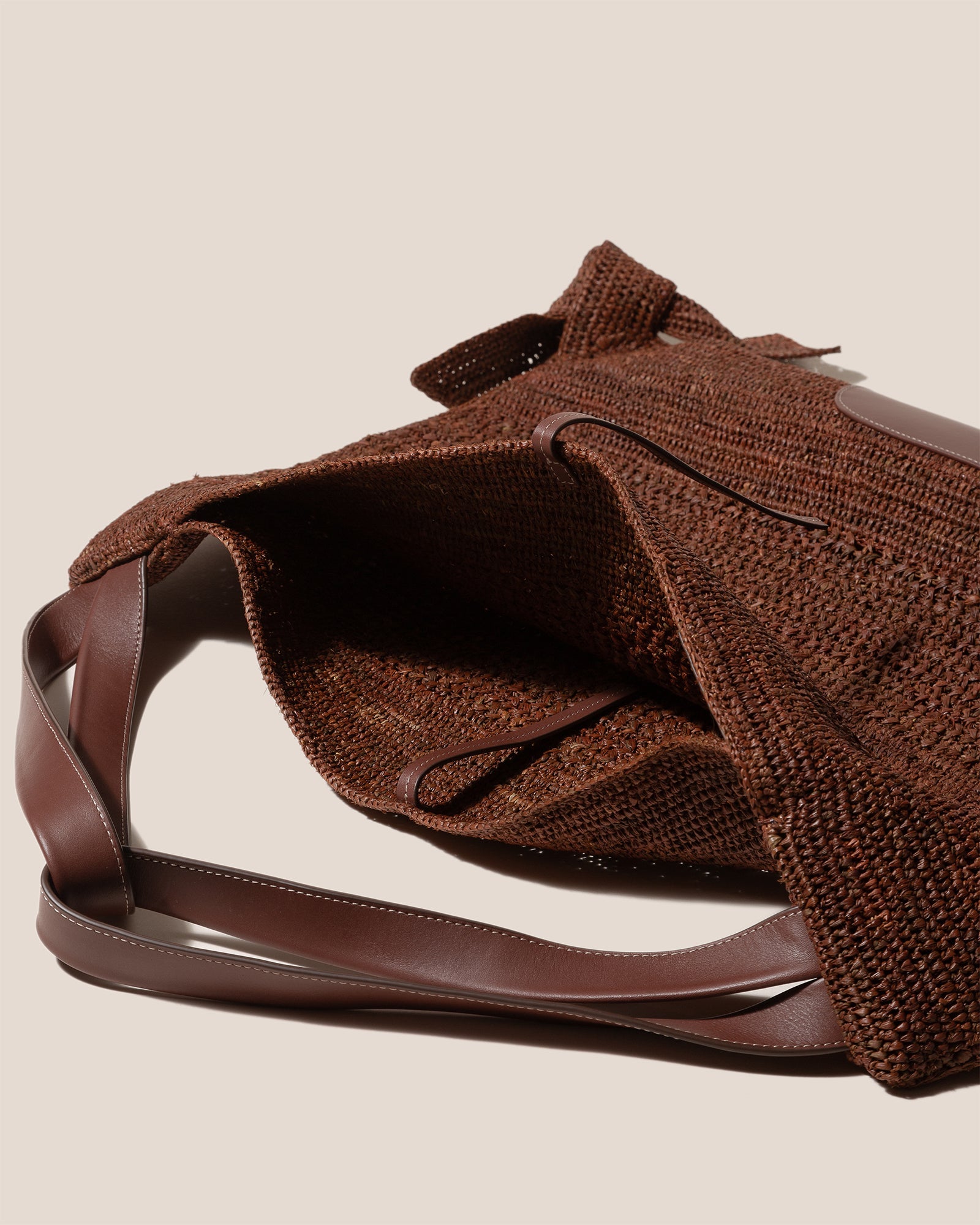 CADOR - Slouchy Crocheted Raffia Shoulder Bag | Hereu online