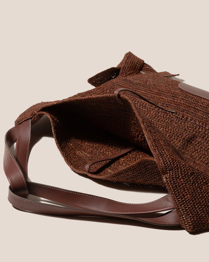 CADOR - Slouchy Crocheted Raffia Shoulder Bag | Hereu online