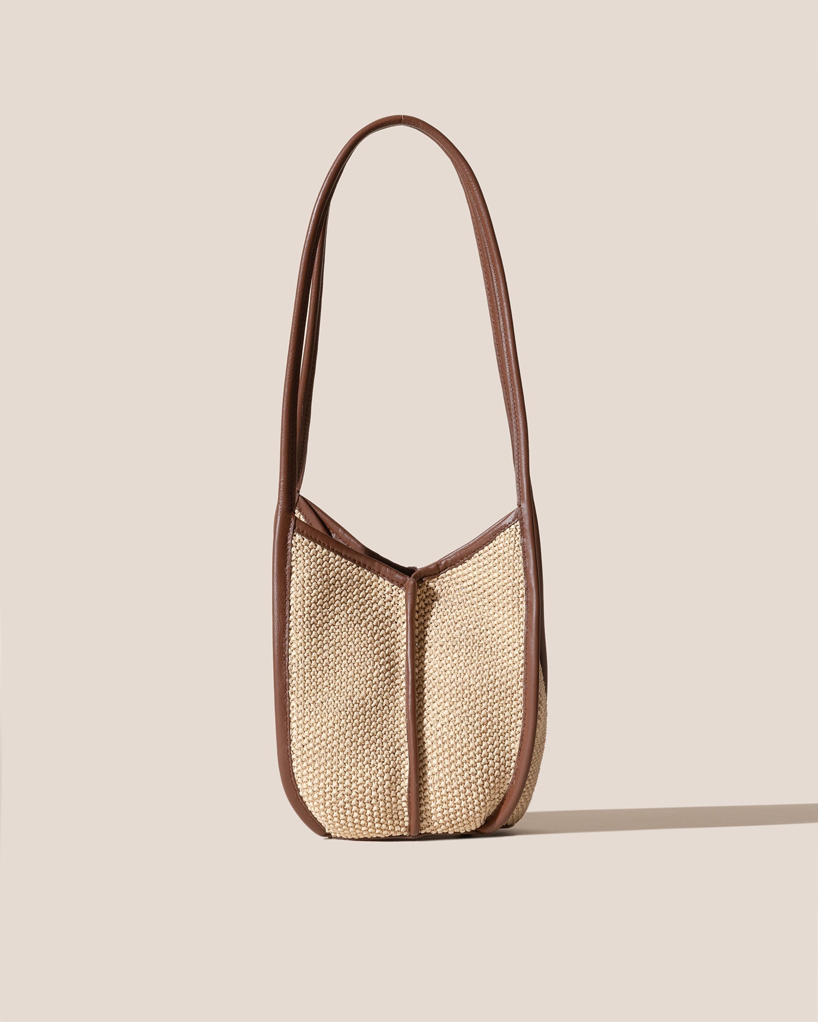CALELLA BUCKET SOFT RAFFIA - Leather-trimmed Shoulder Bag | Hereu outlet
